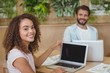 © WavebreakMediaMicro - Portrait of Business executives sitting at desk and using laptop