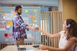 © WavebreakMediaMicro - Graphic designer offering coffee to his colleague