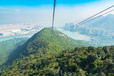 Fototapeta Natura - View from cable car across mountain view at sea and city building