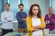 © WavebreakMediaMicro - Portrait of business executive with her colleagues