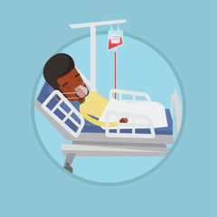 Canvas Print - Patient lying in hospital bed with oxygen mask.