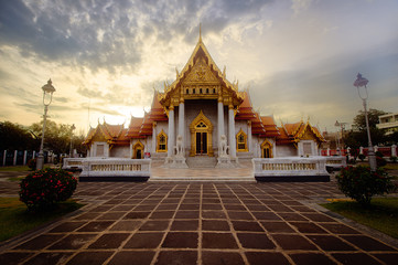 The Marble Temple of Wat Benchamabophit in sunset Bangkok, Thailand.