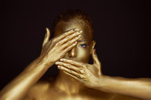Portrait Unearthly Golden Girls, Hands Near The Face. Very Delicate And Feminine. The Eyes Are Open.Frame Of Hands