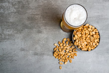 Glass Of Beer And Peanuts