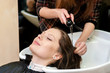 © fotofrol - Beautiful girl washing their hair.