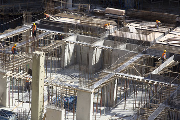 industrial workers working at contruction site building