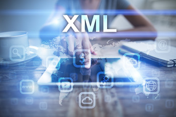 Wall Mural - Woman using tablet pc, pressing on virtual screen and selecting xml.