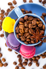 Wall Mural - Coffee cup and beans on a white background.