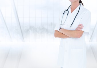 Poster - Doctor mid section with arms folded against blurry window