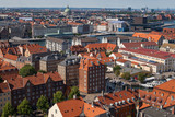 Fototapeta Miasto - Aerial view of Copenhagen red roofs and canal. Christianshavn and central distrinct