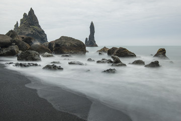 Wall Mural - Reynisdrangar beach in Iceland with its trolls turned to stones legend