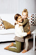 © iordani - little cute brunette girl at home interior happy smiling close up, lifestyle real people concept