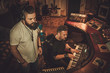 © Nejron Photo - Musicians recording vocal and keyboards in boutique recording studio.
