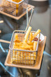 French fries in metal wire basket