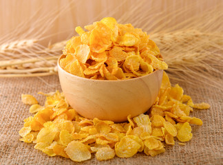 Sticker - cornflakes cereal on wooden background