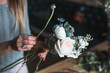 © cherry_d - Florist at work: pretty young blond woman holds fashion modern bouquet of different flowersv