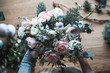 © cherry_d - Florist at work: pretty young blond woman holds fashion modern bouquet of different flowers