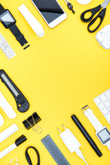 Poster - Flat lay of office supplies, digital devices with copy space on yellow