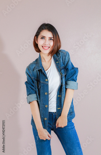Asian Woman Casual Outfits Standing In Jeans And Blue Denim Shirt