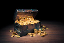 Open Treasure Chest With Gold Coins On A Dark Background