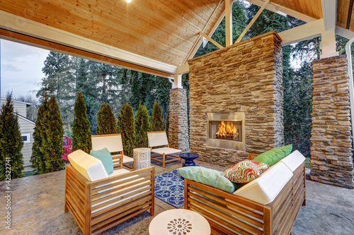 Chic Covered Back Patio With Built In Gas Fireplace Buy This