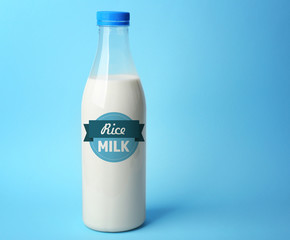 Canvas Print - Bottle of tasty milk on blue background