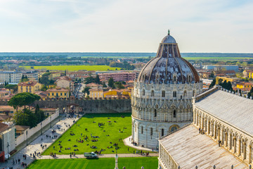 Wall Mural - Aerial view of a baptistery and a cathedral in the italian city Pisa.