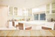 © bongkarn - Empty top wood table in kitchen room. For product display montage.