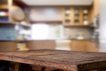 Empty rustic wood table in kitchen room. for product display montage.