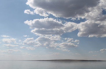 the sky reflected in the water, deserted beach lake, summer sky, nature, blue cloud,