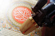 quran and microphone recite Islamic holy book