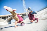 Breakdancers perfrming tricks