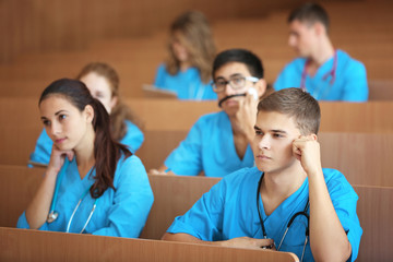 Canvas Print - Smart medical students at lecture indoors