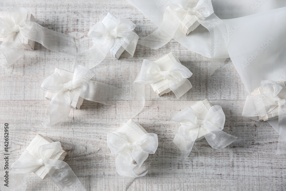 Little gift boxes for wedding day on table
