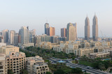 Fototapeta Miasto - dubai, united arab emirates, 05/05/2016, dubai business towers, the greens, tecom living apartment complex in the daytime