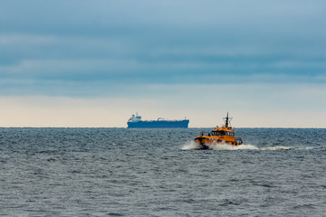 Sticker - Orange pilot ship moving at speed in Baltic sea