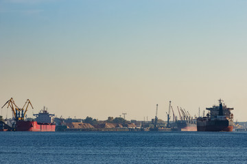 Canvas Print - Cargo ship in the port of Riga, Europe