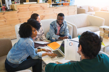 Happy young multiracial group of young university students studying