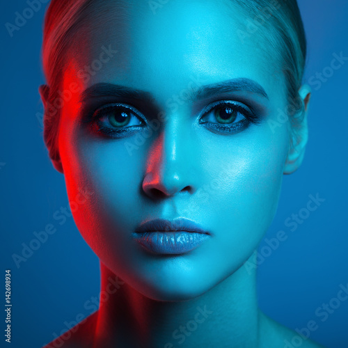 Fashion Art Portrait Of Beautiful Woman Face Red And Blue Light Color Buy This Stock Photo And Explore Similar Images At Adobe Stock Adobe Stock