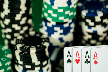 Poker Chips on a gaming table roulette Casino theme background