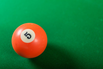 Snooker ball on billiard table