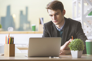 Poster - Handsome guy working on project