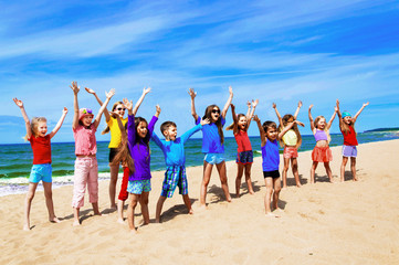 active happy children on the beach
