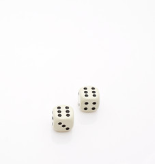 Two dice and number six double isolated on white background. A place for your text and images.