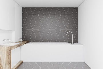 Bathroom with a dark gray wall