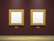 two golden blank picture frames in art gallery museum