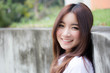 © tiniroma - Portrait of thai adult student university uniform beautiful girl relax and smile
