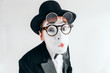 © Nomad_Soul - Pantomime actor face in glasses and makeup mask