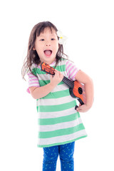 Wall Mural - Little asian girl playing guitar toy over white background