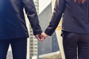 Close up view of business partnership handshake concept.Photo of two businessman handshaking process.Successful deal after great meeting., blurred background